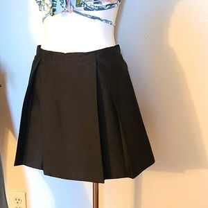 Black pleated designer mini skirt
